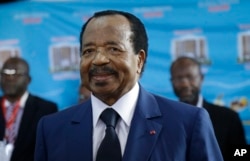 FILE - Cameroon's Incumbent President Paul Biya, of the Cameroon People's Democratic Movement party, waits to cast his vote during the Presidential elections in Yaounde, Oct. 7, 2018.