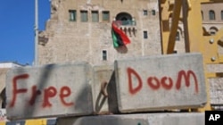 Grafitti in Martyrs' Square in Tripoli, Libya, August 29, 2011