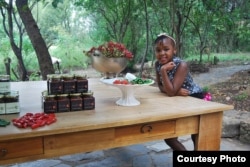 One of Leeko Nkala's daughters poses on the family farm in North West Province, where Nkala learned about food production as a girl. (Photo courtesy Leeko Nkala)