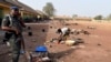 FILE: A policeman stands guard at the internally displaced people camp affected by herders and farmers' violent clashes from Logo and Guma communities at Gbajimba IDPs camp on the outskirts of Makurdi, capital of Benue State in northcentral Nigeria. Taken Jan. 3, 2018