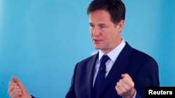 FILE - Britain's Deputy Prime Minister and leader of the Liberal Democrats, Nick Clegg, delivers a speech on international development, in London, May 28, 2014. 