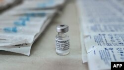 This photograph shows a vial of Pfizer/BioNTech vaccine against the Covid-19 (novel coronavirus) at the health center of Elafonissos, on the Elafonissos Island, on April 23, 2021.