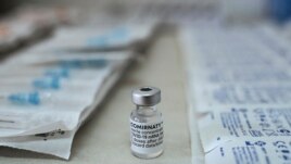 This photograph shows a vial of Pfizer/BioNTech vaccine against the Covid-19 (novel coronavirus) at the health center of Elafonissos, on the Elafonissos Island, on April 23, 2021.