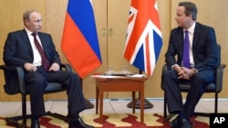 Владимир Путин и Дэвид Кэмерон. 5 июня 2014г.