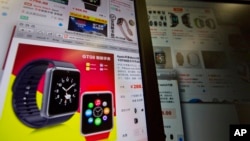 An e-commerce website with a vendor selling the "Apple Smart Watch Bluetooth Bracelet" starting from 288 yuan (US$45) is displayed on a computer screen in Beijing, China, March 12, 2015.