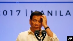 Philippines President Rodrigo Duterte gestures while addressing the media following the conclusion of the 30th ASEAN Leaders' Summit in Manila, Philippines, April 29, 2017.