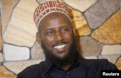 FILE - Former al-Shabab leader Mukhtar Robow attends a news conference in Baidoa, Somalia, Nov. 4, 2018.