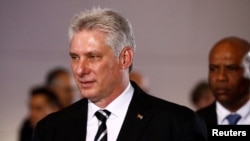 FILE - Cuba's President Miguel Diaz-Canel attends a ceremony at the National Pantheon in Caracas, Venezuela, May 30, 2018. On July 21, 2018, Cuban lawmakers approved Diaz-Canel's Cabinet, keeping most of the ministers from Raul's Castro government in place. 