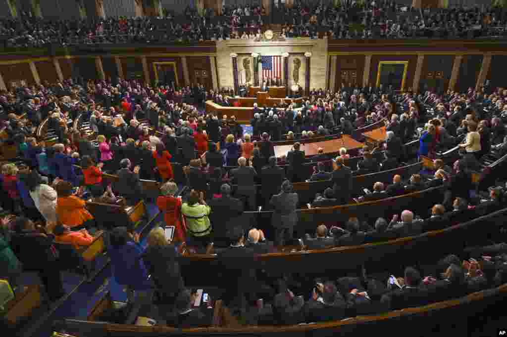 President Barack Obama is applauded as he gives his State of the Union address before a joint session of Congress on Capitol Hill in Washington, Jan. 12, 2016.