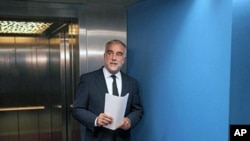 International Criminal Court (ICC) chief prosecutor Luis Moreno-Ocampo arrives to explain during a news conference at The Hague on May 16, 2011 his request for arrest warrants for Libyan leader Moamer Kadhafi, his son Saif al-Islam and the head of the mil