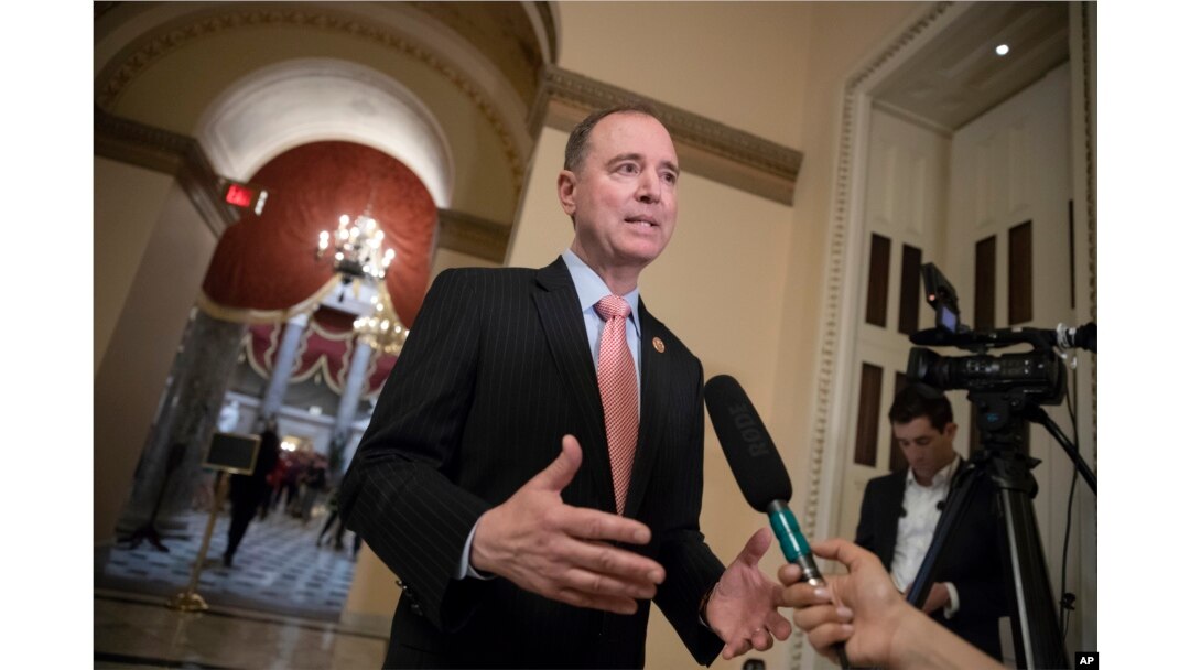 FILE - Rep. Adam Schiff, D-Calif., takes questions from reporters at the Capitol in Washington, May 10, 2018.