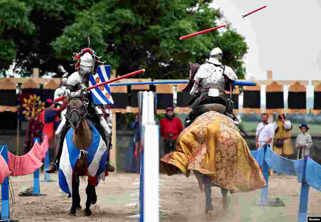 Two knights charge each other with lances in a tournament during the European Championship in Knight Joust at the Spoettrup medieval castle in Denmark.