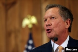 FILE - Ohio Governor John Kasich backs 'arming Ukrainians who want to fight for freedom.'