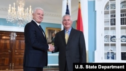 U.S. Secretary of State Rex Tillerson shakes hands with Montenegrin Prime Minister Dusko Markovic before their meeting at the U.S. Department of State in Washington, D.C., May 8, 2017.