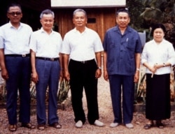 FILE: Pol Pot (2nd R), notorious leader of Cambodia's Khmer Rouge, is shown in a rare photograph with other Khmer Rouge leaders at a camp in Western Cambodia in January, 1986.