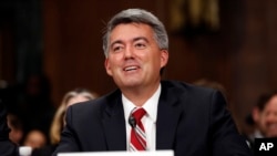 FILE - Sen. Cory Gardner, R-Colo., speaks on Capitol Hill in Washington, Sept. 20, 2017. Early in 2018, Gardner used his power as a senator to freeze all Justice Department nominations after Attorney General Jeff Sessions withdrew Obama-era protections for states like Colorado that had legalized recreational marijuana. He later backed off after reportedly receiving assurances that the DOJ would not interfere with Colorado's marijuana laws.