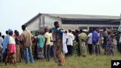 Refugees from Democratic Republic of Congo (DRC) gather in 2009, to escape inter-ethnic violence