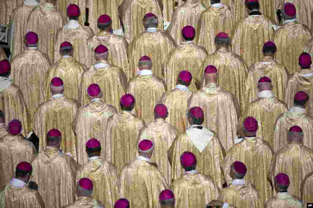 Bishops attend the beatification ceremony of Pope Paul VI and a mass for the closing of of a two-week synod on family issues celebrated by Pope Francis in Saint Peter&#39;s Square at the Vatican. 