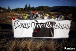 Memorial flowers are seen outside Umpqua Community College in Roseburg, Oregon, Oct. 2, 2015.