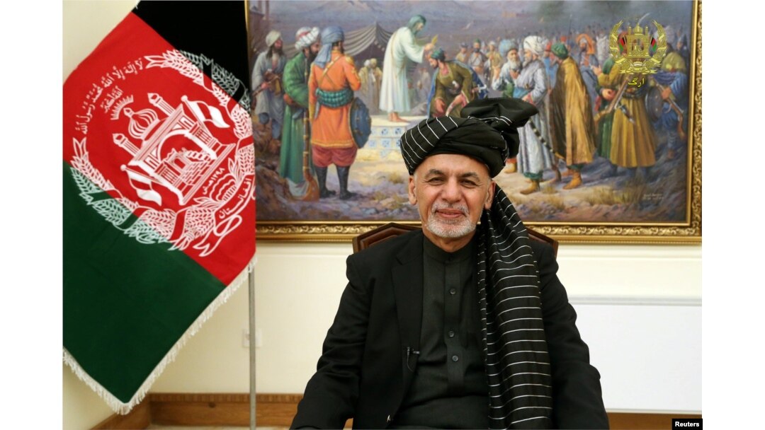 FILE - Afghanistan's President Ashraf Ghani speaks during a live TV broadcast at the presidential palace in Kabul, Afghanistan, Jan. 28, 2019.