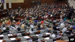 FILE - Afghan parliament members.