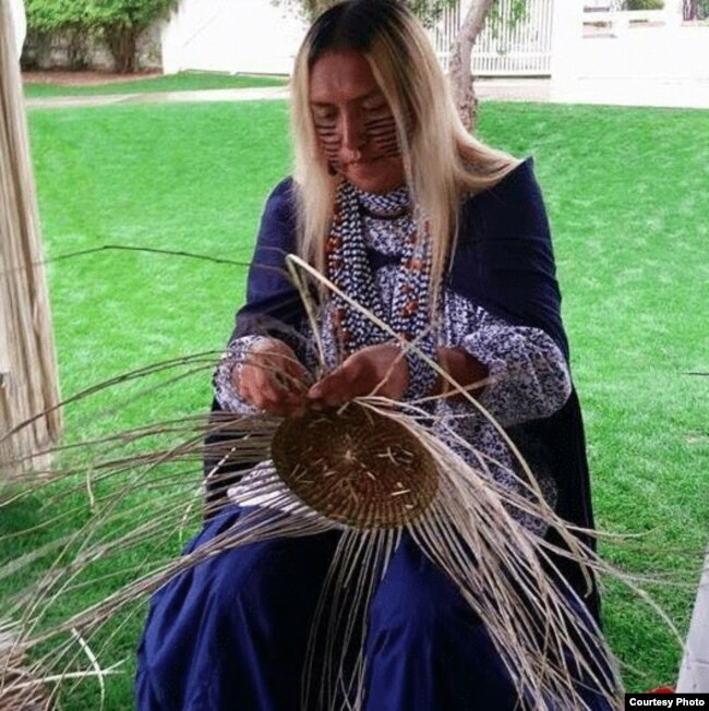 Shown is Timothy "Twix" Ward, San Carlos Apache two spirit, who specializes in the traditional craft of basket weaving. Courtesy: powwows.com