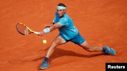 Spain's Rafael Nadal in action during the final against Austria's Dominic Thiem at the French Open, June 10, 2018. 