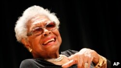 Maya Angelou answers questions at her portrait unveiling at the Smithsonian's National Portrait Gallery in Washington, April 5, 2014.