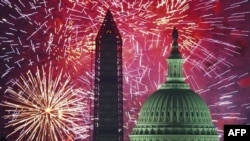 Independence Day fireworks are seen over the US Capitol and Washington Monument in Washington, DC