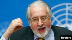 Paulo Pinheiro, chairperson of the International Commission of Inquiry on Syria talks to media during a news conference in Geneva, Sept. 16, 2013.