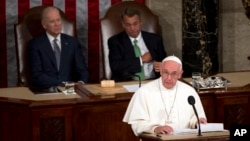 Pope Francis addresses a joint meeting of Congress on Capitol Hill in Washington, making history as the first pontiff to do so, Sept. 24, 2015.