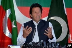 FILE - Pakistan's opposition leader Imran Khan speaks during a press conference in Islamabad, Pakistan, April 10, 2016.