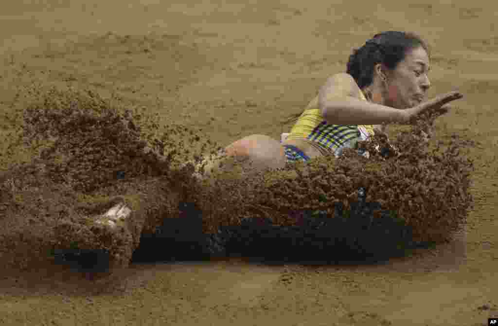 Sweden&#39;s Sofia Linde competes in the long jump of the women&#39;s pentathlon, during the European Athletics Championships in Gothenburg, Sweden.