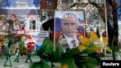 Portret ruskog predsednika Vladimira Putina u jednoj prodavnici u Simferopolju na Krimu