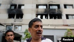 Hỏa hoạn bùng ra tại Xưởng may áo ấm Tung Hai trong quận Mirpur của thủ đô Dhaka, ngày 9/5/2013.
