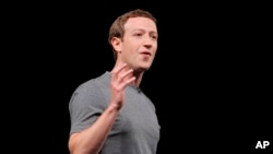 Facebook CEO Mark Zuckerberg gestures during the Samsung Galaxy Unpacked 2016 event on the eve of this week’s Mobile World Congress wireless show, in Barcelona, Spain, Feb. 21, 2016. 