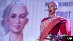 The humanoid robot Sophia, developed by Hong Kong based company Hanson Robotics, appears on stage in front of students and other professionals during a meeting session organised about artificial intelligence in Kolkata on February 18, 2020. 