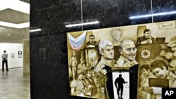 A painting of fallen Russian oligarchs Mikhail Khodorkovsky and Platon Lebedev is displayed at the Central House of Artists in Moscow (file photo)