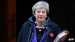 Britain's Prime Minister Theresa May leaves 10 Downing Street in London on Oct. 31, 2018, ahead of the weekly Prime Minister's Questions session in the House of Commons. 