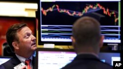 Traders on the floor of the New York Stock Exchange, Sept. 1, 2015.