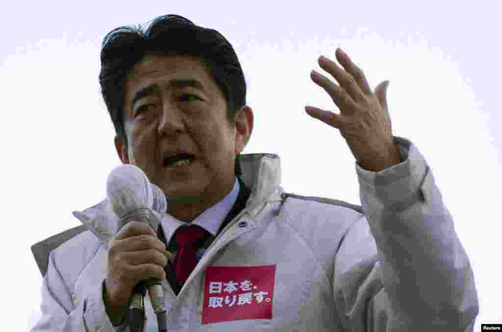 Japan's main opposition Liberal Democratic Party's (LDP) leader and former Prime Minister Shinzo Abe makes a speech during a campaign for the December 16 lower house election in Ageo, north of Tokyo, December 11, 2012. 