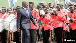 Democratic Republic of the Congo President Joseph Kabila inspects a guard of honor during the anniversary celebrations of the DRC's independence from Belgium in Kindu, DRC, June 30, 2016.