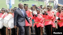 FILE - Democratic Republic of the Congo President Joseph Kabila inspects a guard of honor during the anniversary celebrations of the DRC's independence from Belgium in Kindu, DRC, June 30, 2016.