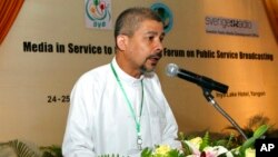 FILE - Aye Chan Naing, executive director of the Democratic Voice of Burma, speaks at a seminar, "Media in Service to the Public : A Forum on Public Service Broadcasting," at Inya Lake Hotel Sept. 24, 2012, in Yangon, Myanmar.