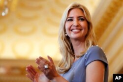FILE - Ivanka Trump applauds during an event at the State Department in Washington, June 27, 2017.