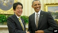 Japanski premijer Šinzo Abe i predsednik Barak Obama tokom susreta u Beloj kući