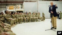 U.S. Defense Secretary Chuck Hagel speaks to members of the military during his visit to Bagram Airfield in Bagram, Afghanistan, June 1, 2014.