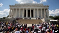 Participants gather on the steps of the Lincoln Memorial during an event to commemorate the 50th anniversary of the 1963 March on Washington, Aug. 24, 2013.