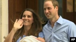 In this image from video, The Duke and Duchess of Cambridge leave the Lindo Wing of St Mary's Hospital in London, July 23 2013, carrying their new-born son, the Prince of Cambridge who was born Monday, into public view for the first time.