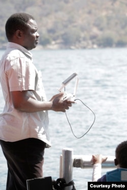 Malawi freelance journalist Eldson Chagara flies his drone above Lake Malawi in Mangochi district in this undated photo. (Photo courtesy of Eldson Chagara)